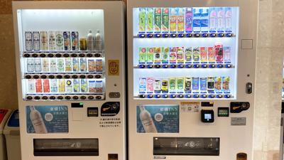 Vending machine is in front of the elevators on the 1st floor.